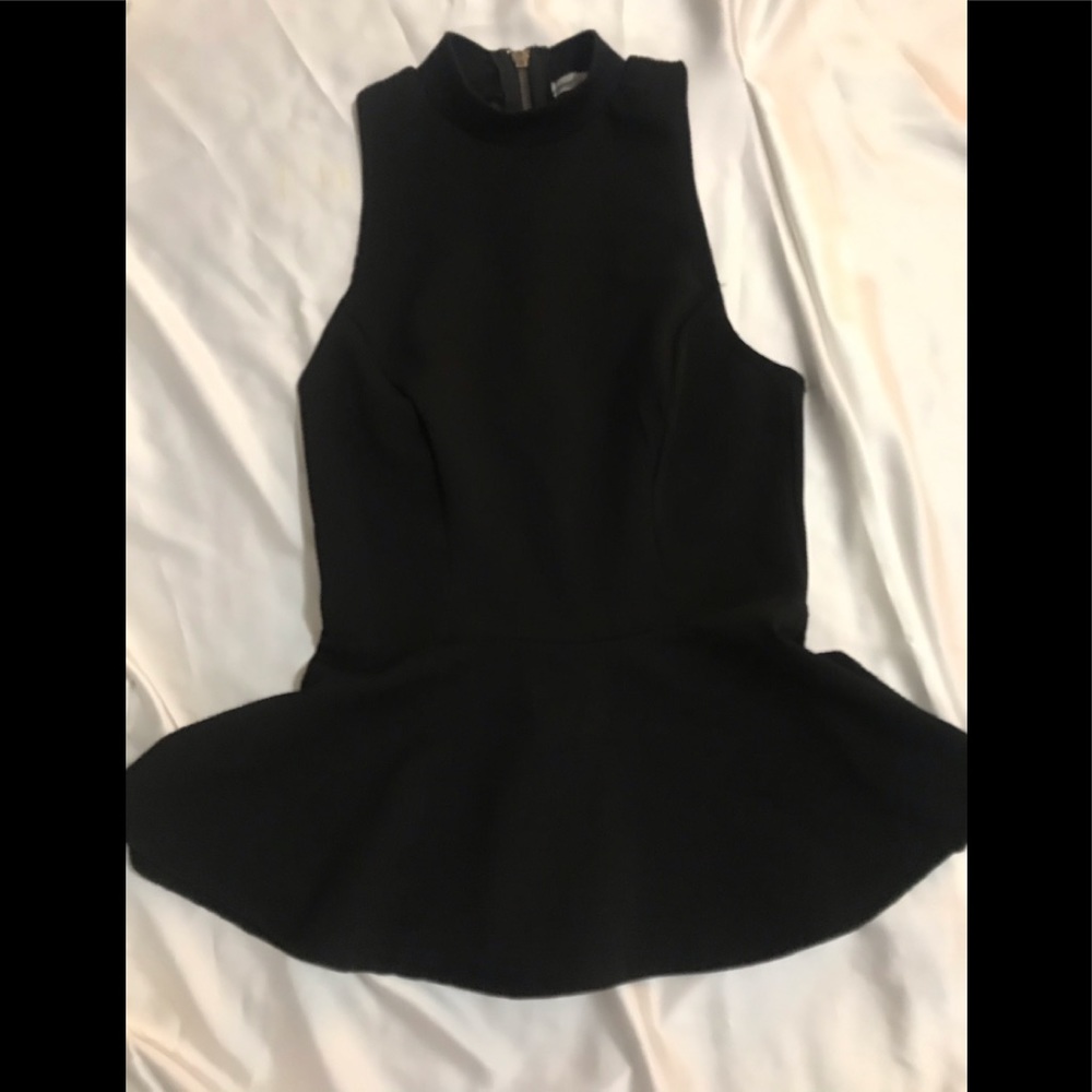 Black peplum top with sheer black